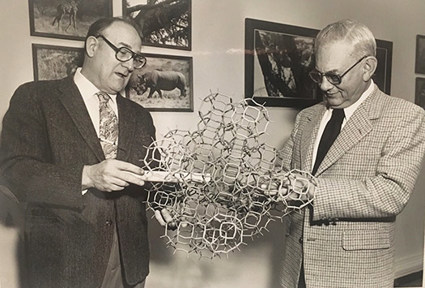 FIG. 3. Rosinski (left) and Plank (right) demonstrate their invention of zeolite catalyst prior to being inducted into the National Inventors Hall of Fame in 1979. Photo courtesy of the National Inventors Hall of Fame.