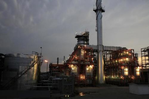 A storage tank and a processing plant are seen at the Miguel Hidalgo refinery in Tula. Photo courtesy of Reuters.